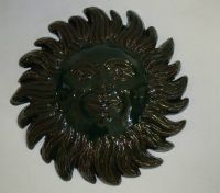 Soleil émaillé vert foncé diamètre 23 cm